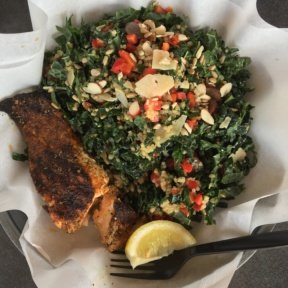 Gluten-free kale salad with salmon from Ocean Market Grill